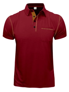 Detail of dark red Polo shirt showing contrast stitching on collar and chest pocket