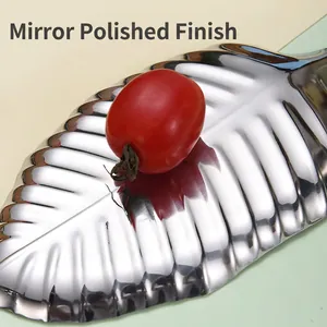 Leaf-shaped golden stainless steel tray with mirror finish and vein textures