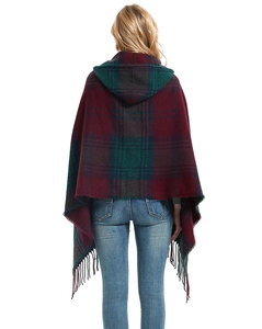 Back view of a red and green plaid hooded poncho with decorative fringe tassels