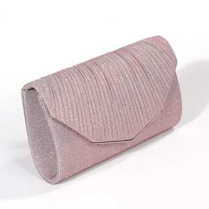 Detail of pink glitter evening clutch with pleated texture and silver metal trim