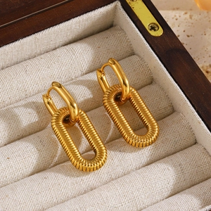 Minimalist 18K gold plated stainless steel hoop earrings with spiral texture oval pendant