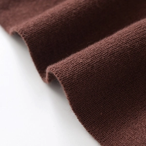 Women's trendy dark brown layered knit top featuring fine texture and soft fabric detail