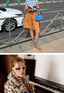 Chic outfit detail with leopard faux fur jacket, blue shoulder bag and retro sunglasses