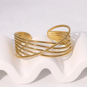 Minimalist gold geometric overlapping cross open bangle for women made of stainless steel