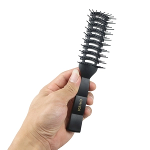 All-black anti-static vent brush for men's styling with rounded tips and CH1200 model