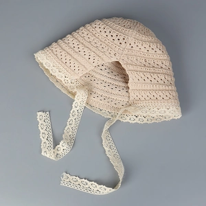 Elegant summer crochet hollow lace sun hat with adjustable straps for beach protection