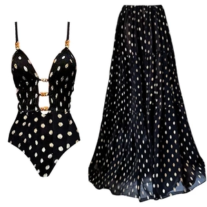 Polka dot deep V-neck swimsuit with gold chain detail and matching tiered maxi skirt