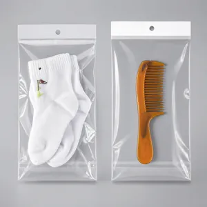 Bolsa de embalaje transparente con cartón blanco para calcetines y peines