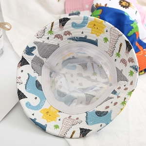 Inside view of a cartoon dinosaur kids bucket hat showing its breathable mesh lining