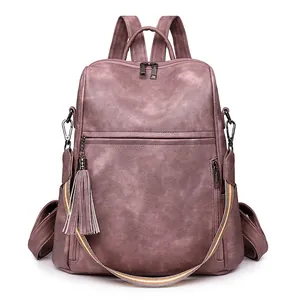 Retro mauve PU leather backpack for women with tassel charm and striped strap