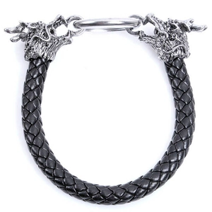 Retro black braided leather bracelet featuring vintage silver metal dragon head clasps