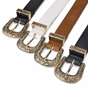 Vintage style women's wide belts with embossed gold pin buckles in black, white, and brown