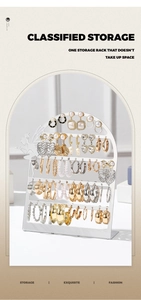 Detail view of the 5-tier white metal earring holder showing classified storage capacity