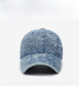 Detail view of distressed blue denim baseball cap with SPO white 3D letter embroidery