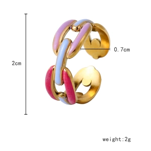 Detail of gold chain-link open ring with colorful pink and blue enamel drips