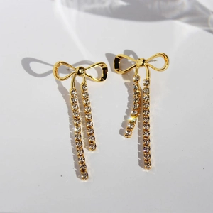 Golden bowknot tassel earrings with rhinestones for a elegant Rococo style look