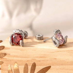 Titanium steel serpent screw studs with red and pink heart-arrow cubic zirconia stones