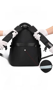 Detail showing reinforced honeycomb breathable shoulder straps and hidden anti-theft back pocket