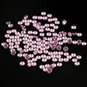 Loose pink round-cut cubic zirconia gemstones with 5A brilliance on a black background