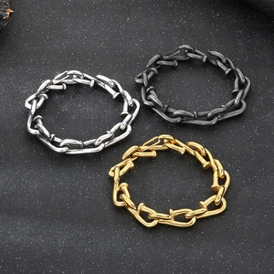 Minimalist nail-inspired chain bracelets in gold, silver, and gunmetal finishes for men