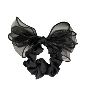 Elegant black organza oversized scrunchie with sheer bow and silky finish on white background