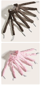 Detail showing soft quilted heatless hair rollers in dark brown and pink colors