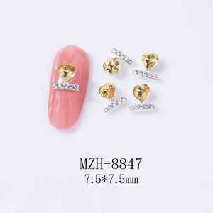 Macro shot of 7.5mm heart-shaped gold nail crystal with micro-set silver base