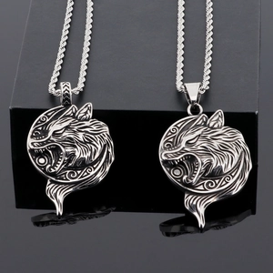 Nordic Viking wolf head pendant necklace in stainless steel with intricate celtic engraving