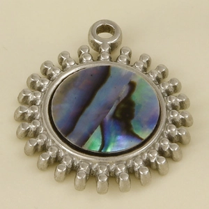 Detailed close-up of a 304 stainless steel sun pendant with colorful abalone shell inlay