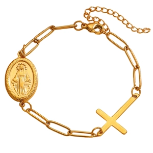 Gold paperclip chain bracelet with a Miraculous Medal and sideways cross pendant