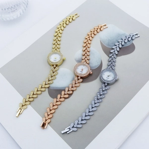 Elegant women's rhinestone quartz watch set in gold, rose gold and silver finishes