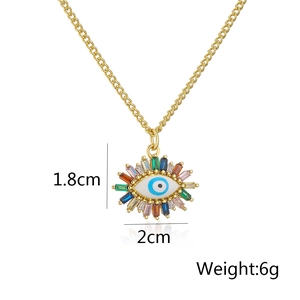 Detail view of evil eye necklace with colorful zircons and precise dimensions 1.8x2cm