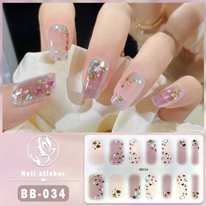Close-up of BB-034 5D gel nail stickers with gold foil and sparkling colorful glitter