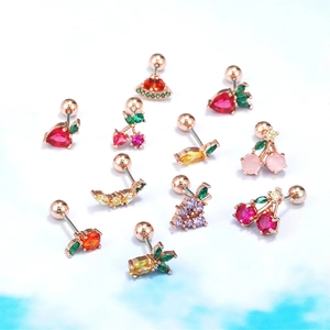 Macro detail of colorful fruit studs with cubic zirconia and screw-back ball closures