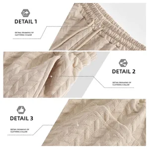 Beige jacquard drawstring shorts with waffle texture featuring elastic waist and pockets