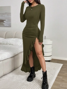 Deep olive green ribbed knit dress with long sleeves, ruffle hem and side slit detail