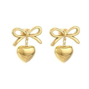 Elegant 18k gold plated stainless steel bow and heart drop earrings on a white backdrop