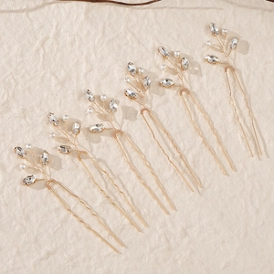 Lot de 6 épingles à cheveux dorées en U avec cristaux et perles sur fond texturé