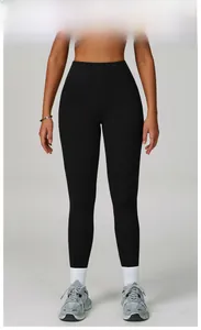 Premium black high-waisted yoga leggings with wide waistband and matte stretch fabric