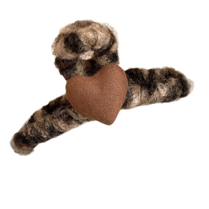 Elegant leopard print plush hair claw with brown heart detail for women's winter hairstyles