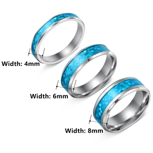 Polished stainless steel rings with blue opal inlay in 4mm, 6mm, and 8mm widths
