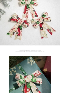 Detail of red truck and Christmas tree printed burlap bows used for gift wrapping decoration