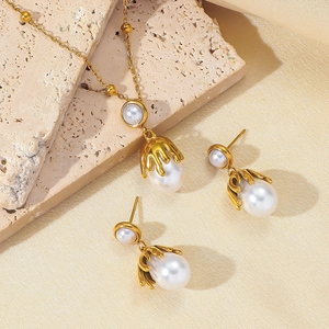 Vintage irregular pearl pendant necklace and earrings set in gold plated titanium steel