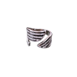 Vintage silver open ring with three rows of zircons and textured wing patterns