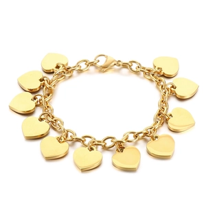 Polished 18K gold plated stainless steel chain bracelet with dangling heart charms