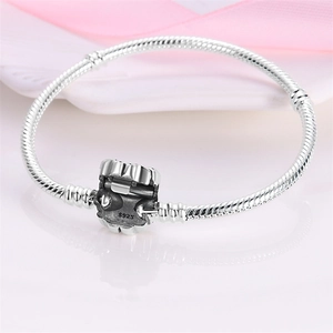 Elegant S925 sterling silver snake chain bracelet with floral patterned clasp detail