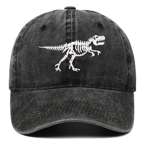 Close-up of dinosaur skeleton embroidery on washed cotton charcoal baseball cap