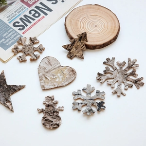 Natural birch bark Christmas ornaments in snowflake and star shapes for festive DIY decor