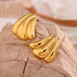 Vintage 18K gold plated 316L stainless steel pumpkin shape earrings on natural stone