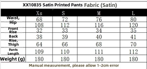 Tableau des tailles détaillé pour pantalon en satin imprimé avec mesures de taille